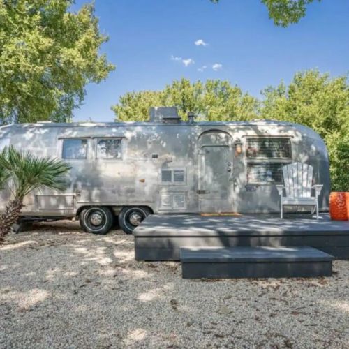 Step up onto the deck and make yourself right at home at the Airstream