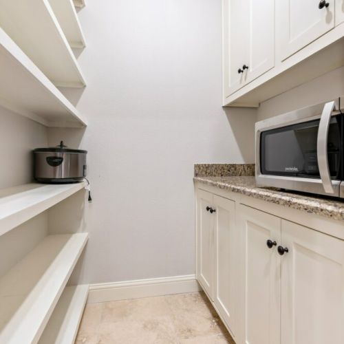 Pantry  Off Laundry Room With Microwave