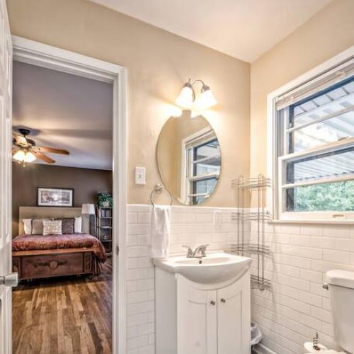 Master Bathroom is a Jack and Jill bathroom between the Master Bedroom and Bedroom with Twin Beds