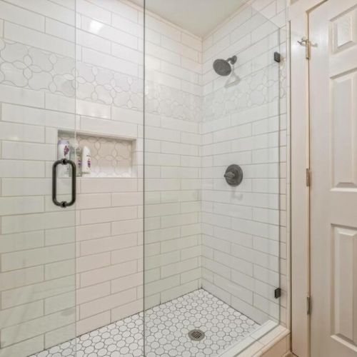 Full sized bathroom with shower