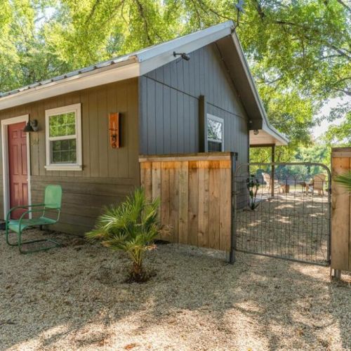 The Brazos River Cabin has its own private drive with a side gate that leads to the backyard and the river. Bring your canoes and paddle boards!