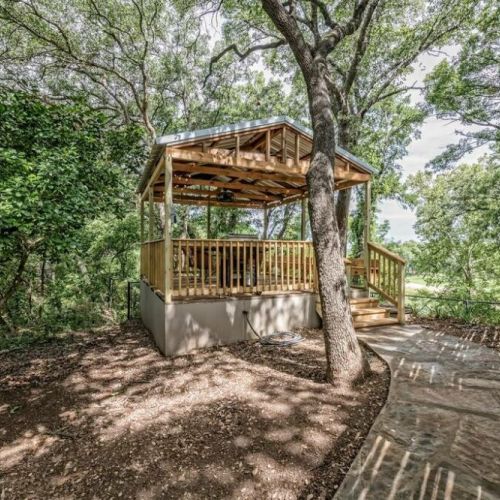 Your covered deck that overlooks the Brazos River.  There is no river access from the Cabin.